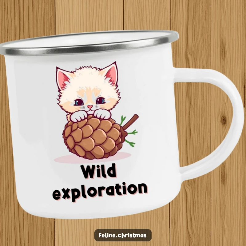 Funny fluffy kitten pouncing on a rolling pinecone on a camping mug, for playful adventures.