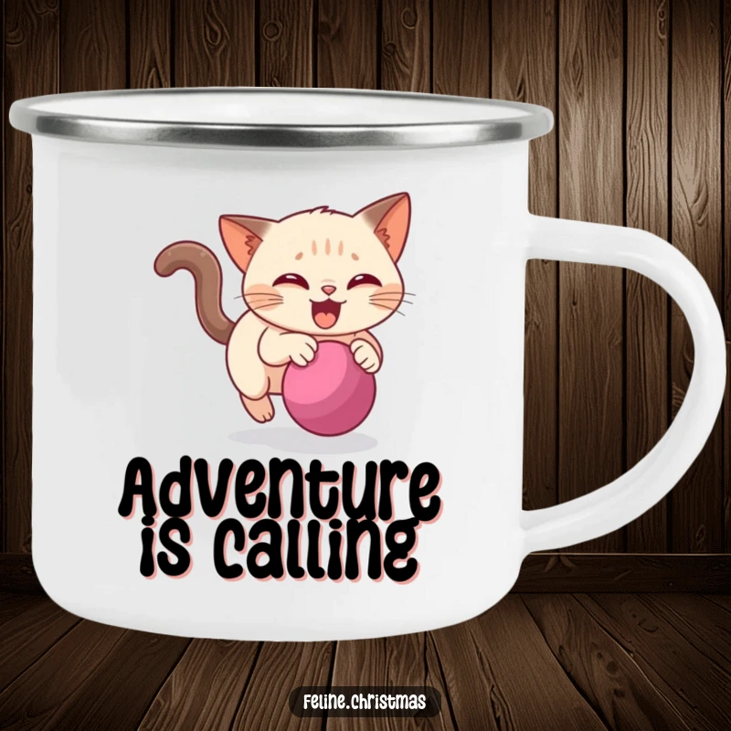 Funny Siamese cat camping mug depicting a cat chasing a bauble, ready for any outdoor escapade with a touch of humor.