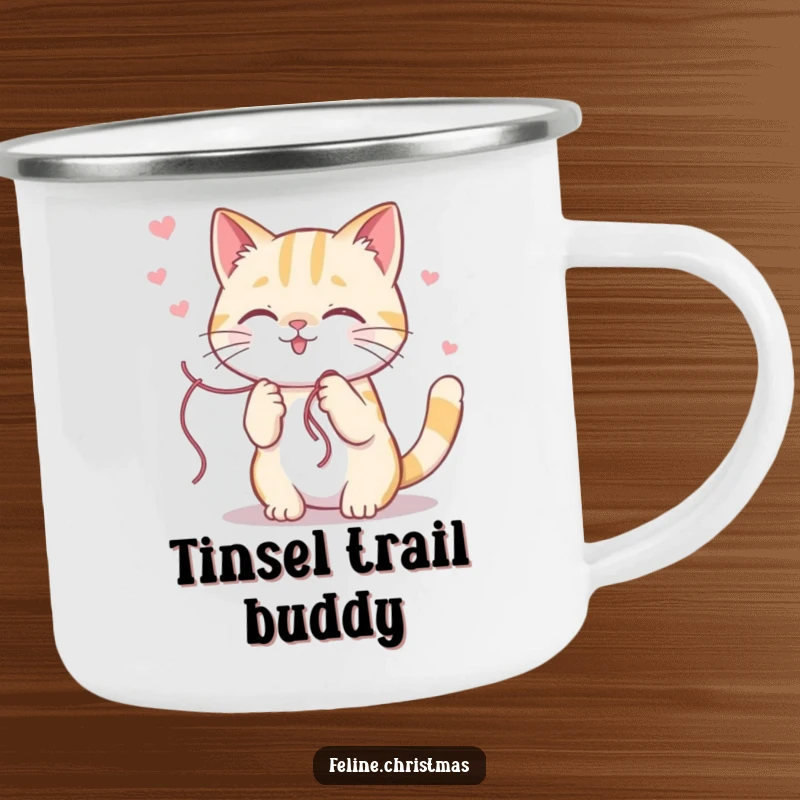 Funny kawaii cat character happily playing with a vibrant string of holiday tinsel, depicted on a durable camping mug.
