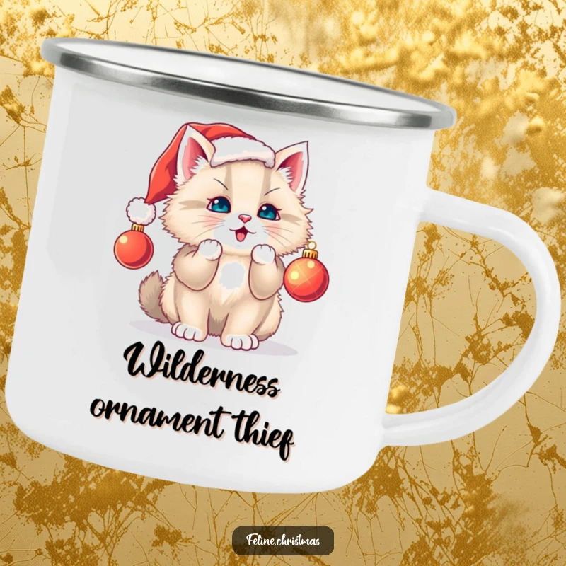 Funny cat camping mug: enamel mug with a fluffy kitten in a Santa hat batting a Christmas ornament, ideal for outdoors.