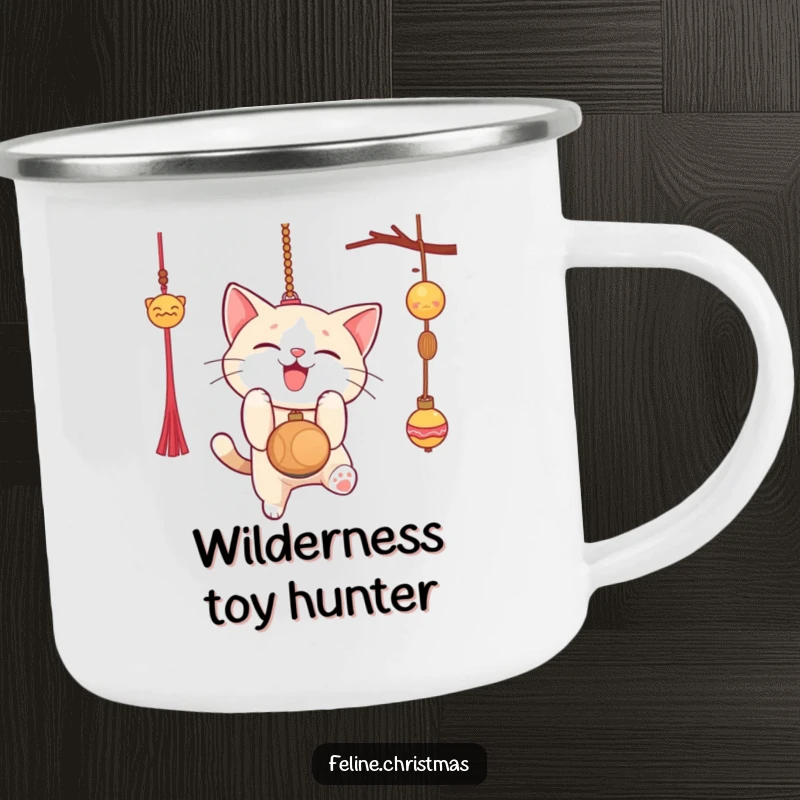 Funny camping mug with a cat gleefully pouncing on a Christmas ornament, durable and humorous for holiday adventures.