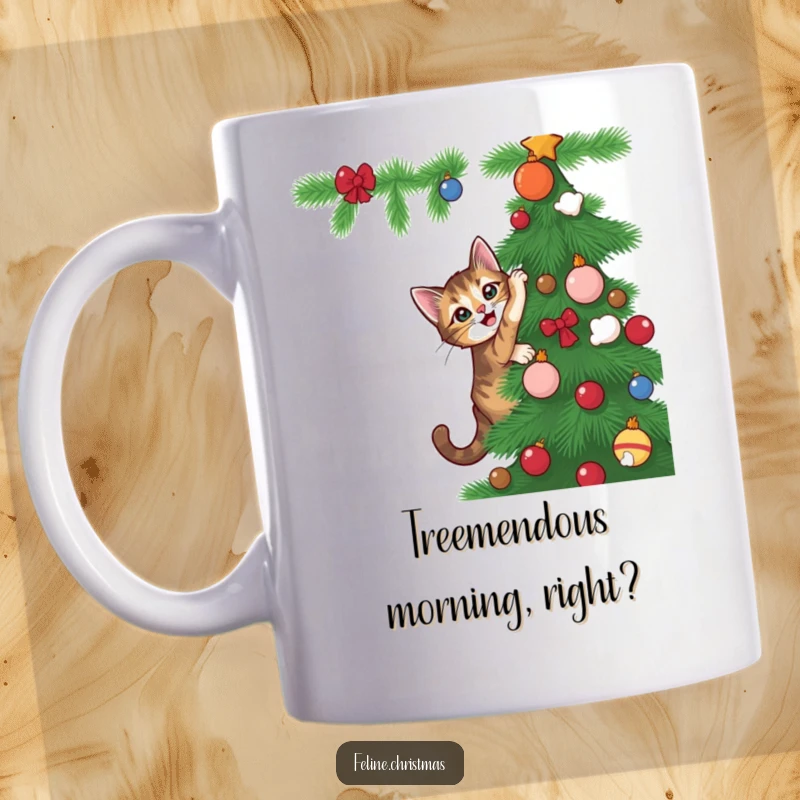 Funny Tabby cat hilariously attempting to climb a Christmas tree with playful, mischievous intent on a coffee mug.