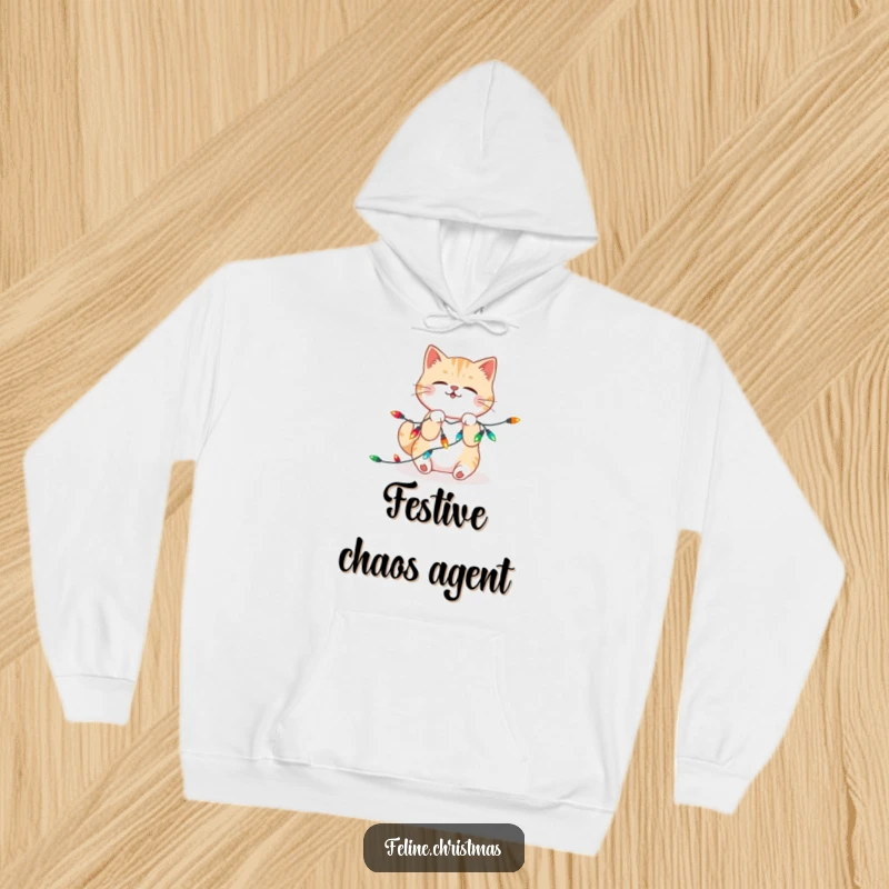 Funny Hoodie: Adorable kawaii cat playfully wrestling and getting tangled in bright, festive Christmas lights, showing holiday spirit.
