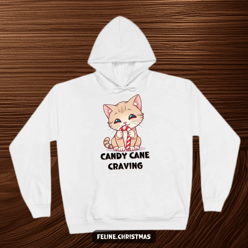 Funny hoodie showcasing a smiling cat curiously sniffing a candy cane, embodying sweet holiday mischief.