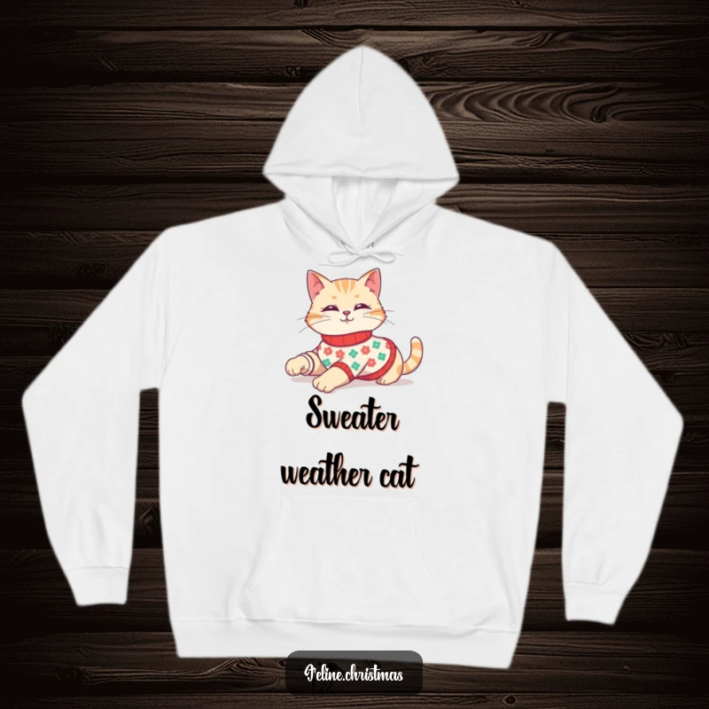Funny hoodie featuring a cute cat languidly stretching while wearing a festive sweater, perfect for cozy holidays.