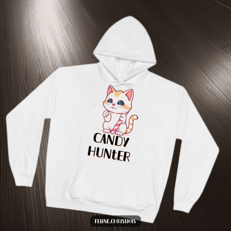 Funny Hoodie: Kawaii cat playfully batting at a magical, edible candy cane, embodying festive holiday sweetness and joy.