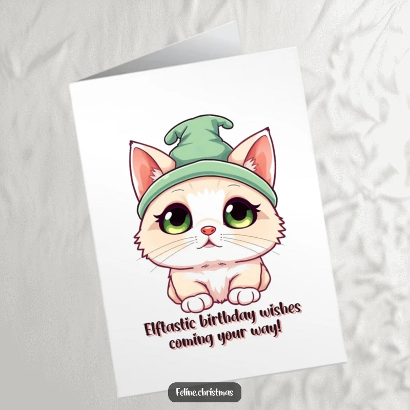 Funny Free Printable Elf Cat Birthday Card featuring a kawaii ragdoll kitten with an elf hat and innocent eyes.