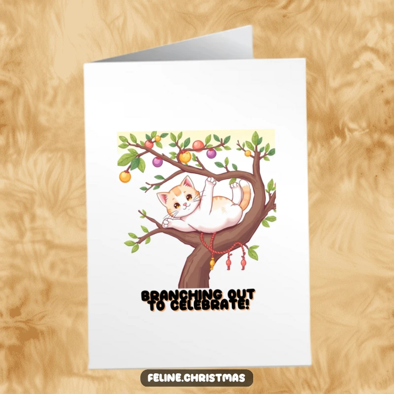 Funny Free Printable Congratulations Card: A cat playfully stretching on a decorated tree branch, celebrating success with feline grace.