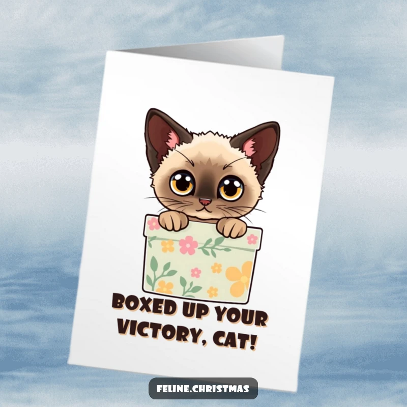 Funny Free Printable Congratulations Card: A Siamese cat with wide eyes peeks from a decorated gift box, symbolizing a delightful surprise.