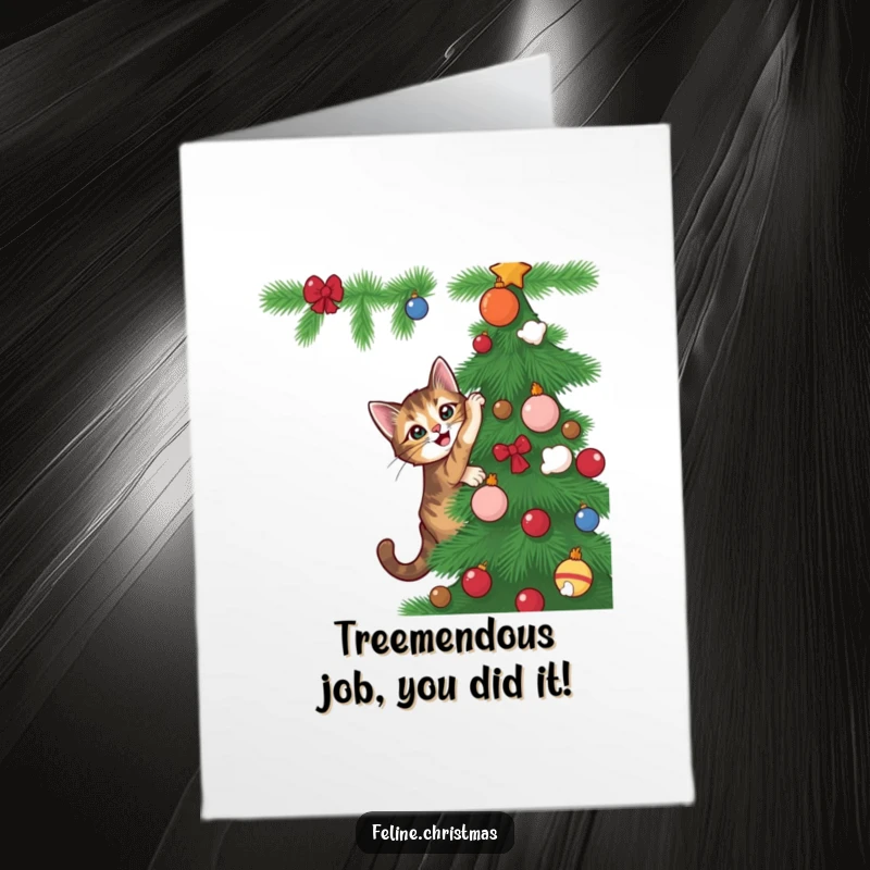 Funny Free Printable Congratulations Card showing a tabby cat adventurously climbing a Christmas tree, a unique downloadable message.