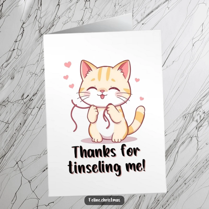 Funny Free Printable Thank You Card: A cute kawaii cat playfully batting at a string of tinsel, expressing sweet gratitude.