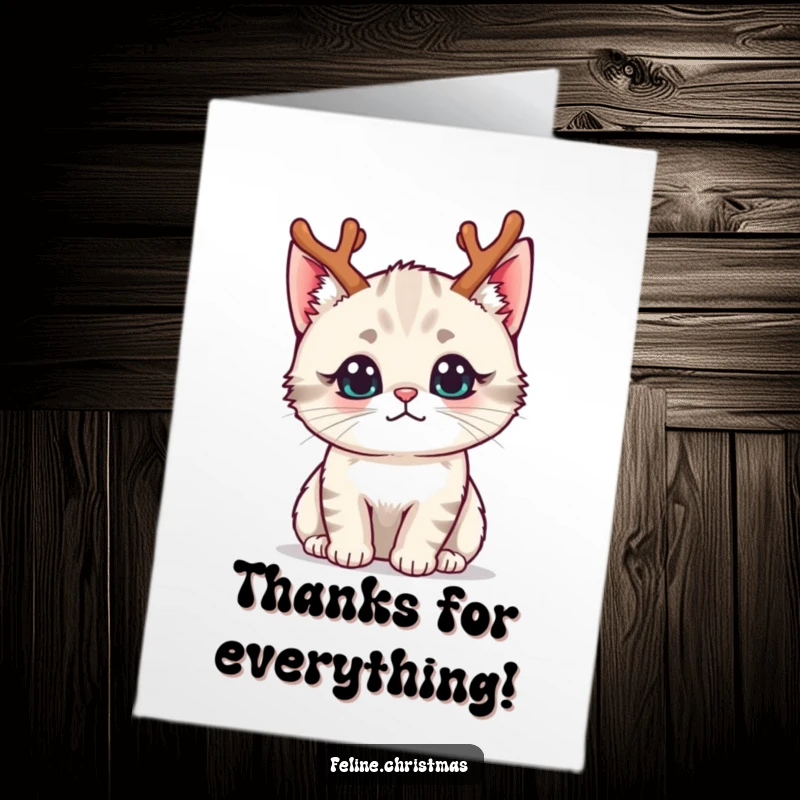 Funny free printable thank you card: Curious kawaii cat wearing tiny reindeer antlers, ideal for expressing thanks.