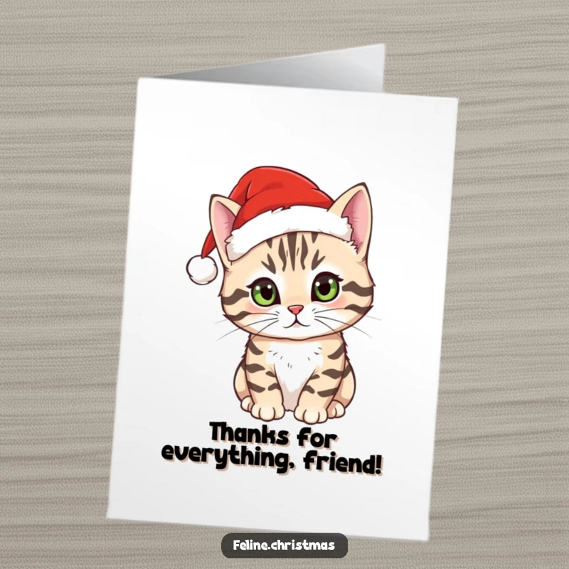 Funny Free Printable Thank You Card: Tabby cat sporting a small Santa hat, with wide, curious eyes.