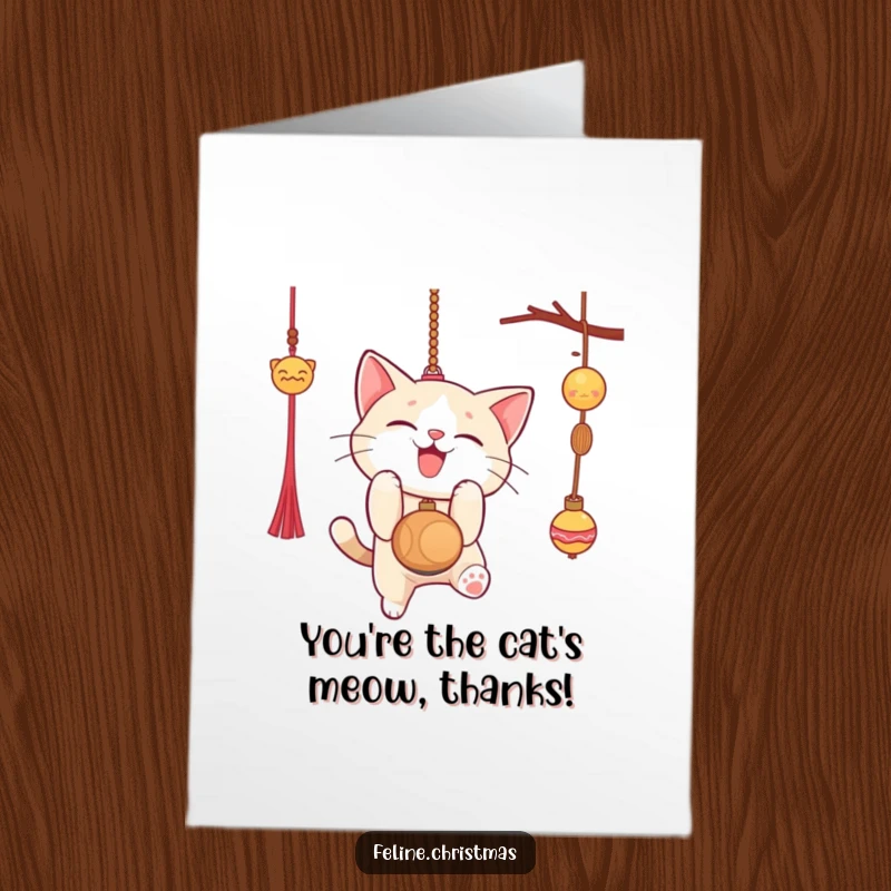 Funny Free Printable Thank You Card: Cat playfully pouncing on an ornament, sending thanks with energy.