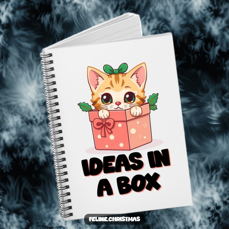 Funny cat notebook: cover depicts a curious kitten peeking out from a festive Christmas gift box with wide eyes.