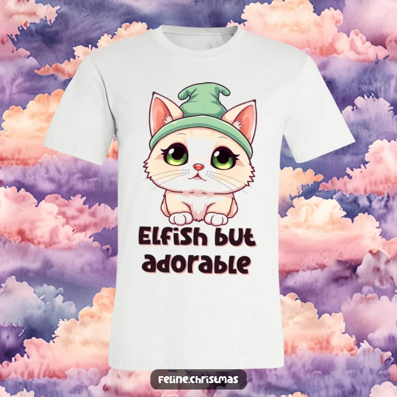 Funny Kawaii Ragdoll Elf Cat T-Shirt: A cute cat in a tiny elf hat looking up with wide, innocent eyes, full of holiday wonder.