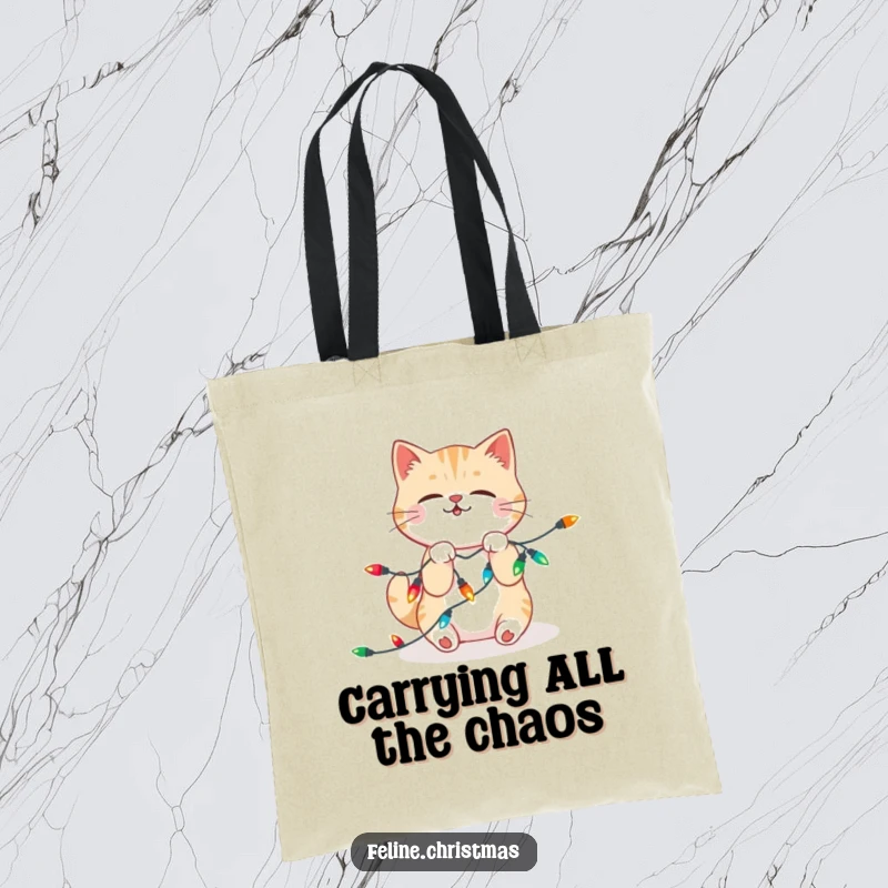 Funny Tote Bag: Kawaii cat hilariously tangled up in a string of bright, festive Christmas lights, a picture of holiday energy.