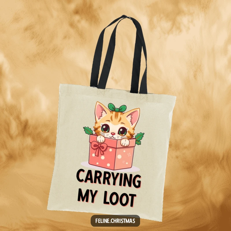 Funny cat tote bag: a curious kitten emerges from a festive Christmas gift box, ready for holiday adventures.